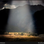 Sunlight streams int Moraine Valley at Rocky Mountain National Park, CC