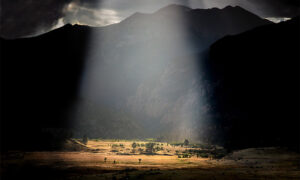 Sunlight streams int Moraine Valley at Rocky Mountain National Park, CC